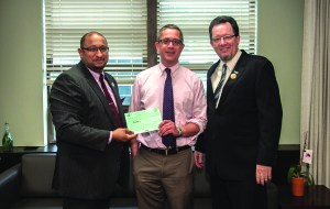 FROM LEFT: DC 37 Exec. Dir. Henry Garrido, Local 1321 president John Hyslop, and union director of technology, Chris Wilgenkamp celebrate organizing effort. Photo by Mike Lee