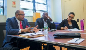 FROM LEFT: DC 37 Executive Director Henry Garrido welcomes the new DC 37 members as Social Service Employees Union Local 371 Grievance Rep Alex Parker and Assistant Director Rose Lovaglio-Miller of the DC 37 Research and Negotiations Dept. note possible issues for first contract bargaining. Photo by Mike Lee