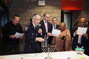 FESTIVAL OF LIGHTS From left: Local 299 member Rabbi Alvin Kass, Jewish Heritage Committee Chair Dr. Lenny Davidman, president of Local 1189, Jackie Rowe-Adams, Local 299 president, and DC 37 Treasurer and Local 1407 Pres. Maf Misbah Uddin. Photo: Clarence Elie-Rivera