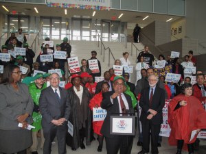 DC 37 Treasurer and Local 1407 President Maf Misbah Uddin speaks a Nov. 15 news conference in which health-care advocates urged Gov. Andrew Cuomo to sign legislation that would improve funding for safety-net hospitals. At his left are Public Advocate Letitia James and Comptroller Scott Stringer. To Uddin's left are New York State Assembly member Richard N. Gottfried and Judy Wessler, former director of the Commission on the Public Health System. Photo: Diane S. Williams.