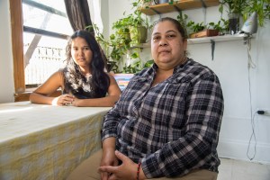Eva Ozoria, with her daughter, is able to stay in her apartment thanks to the legal help of MELS attorney Admarie Llewellyn. Photo: Clarence Elie-Rivera