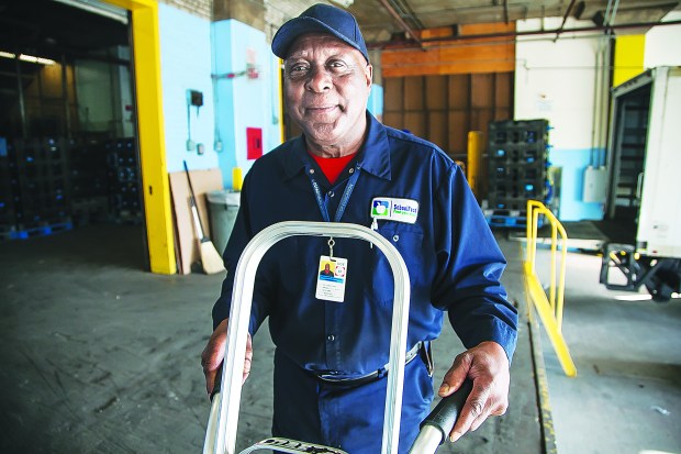 Dept. of Education Loader and Handler and Local 372 member Bill Clark has been serving the city since 1959, and is still going strong. Photo: Clarence Elie-Rivera